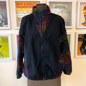Retro 80s Black Windbreaker with Neon Paint-Splash Print